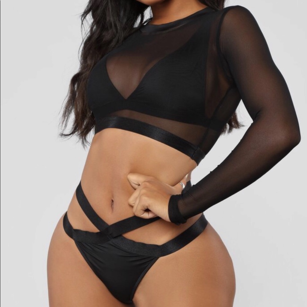 3 piece swim suit. Mesh top is separate from suit.